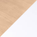 Light maple wood texture diagonally paired with white paper - minimalist desktop background ideal for mockups, product photography, and stationery flatlays