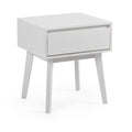 White mid-century modern nightstand with single drawer and tapered legs, minimalist bedside table for bedroom furniture on white background