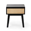 Modern black and natural wood nightstand with one drawer and tapered legs, minimalist bedside table on white background