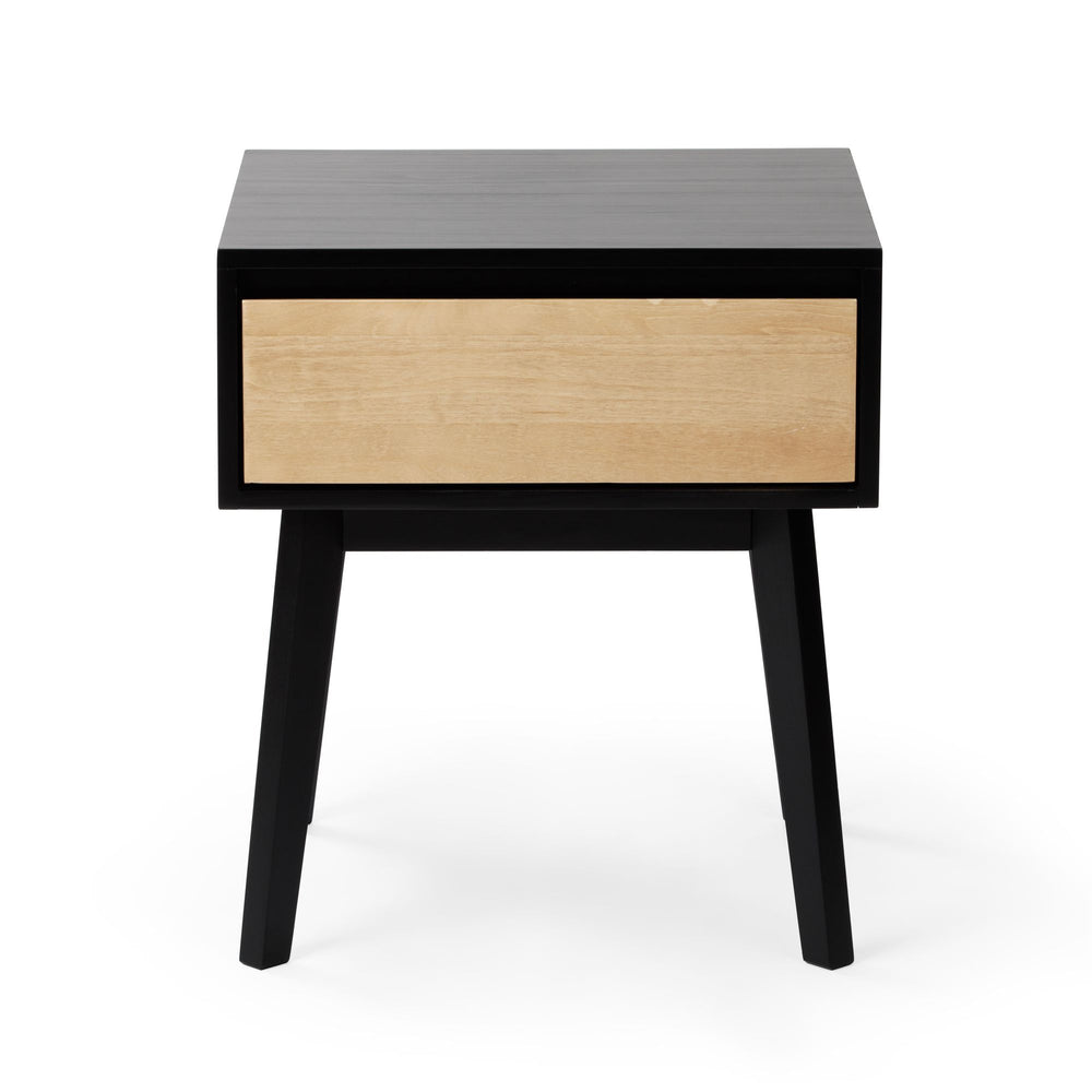 Mid-century modern black and wood nightstand with single drawer and angled legs.