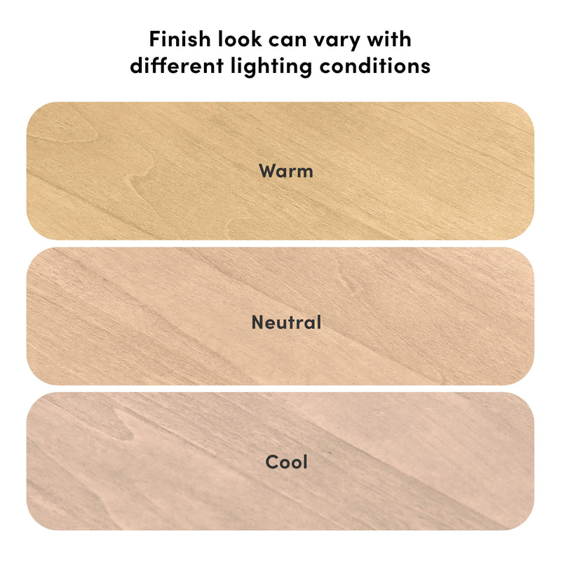 Wood finish sample board showing how color and tone change under different lighting conditions, labeled warm, neutral, and cool swatches with visible wood grain