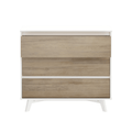 Modern Scandinavian three-drawer dresser with white frame and light oak drawer fronts on angled legs, bedroom storage chest