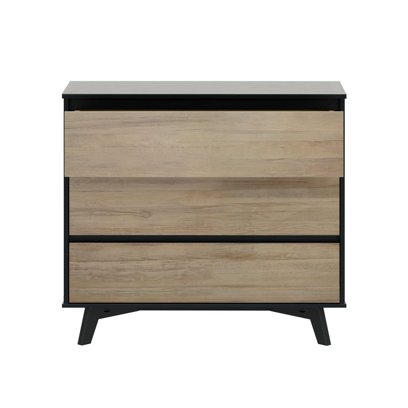 Modern mid-century three-drawer dresser in light oak veneer with matte black frame and angled legs — compact bedroom storage chest