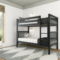 Black wooden bunk bed in a modern kids' bedroom with white walls, striped bedding and decorative pillows, wall sconces, patterned area rug and hardwood floors by a window with bamboo blinds