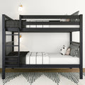 Black twin-over-full bunk bed with ladder, white bedding and patterned pillows in a minimalist bedroom with wall sconces