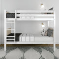 White wooden bunk bed with ladder in a modern minimalist bedroom, white and black striped bedding, decorative pillows, wall-mounted sconces, and patterned area rug