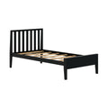 Black wooden platform bed frame with vertical slatted headboard and exposed wooden mattress slats, modern minimalist bedroom furniture on white background