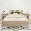 Minimalist bedroom with light wood bed frame, neutral linen bedding, green accent pillows, wooden nightstands and wall sconces on patterned rug