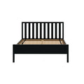 Black wooden platform bed frame with vertical slatted headboard and exposed wooden mattress slats, minimalist bedroom furniture