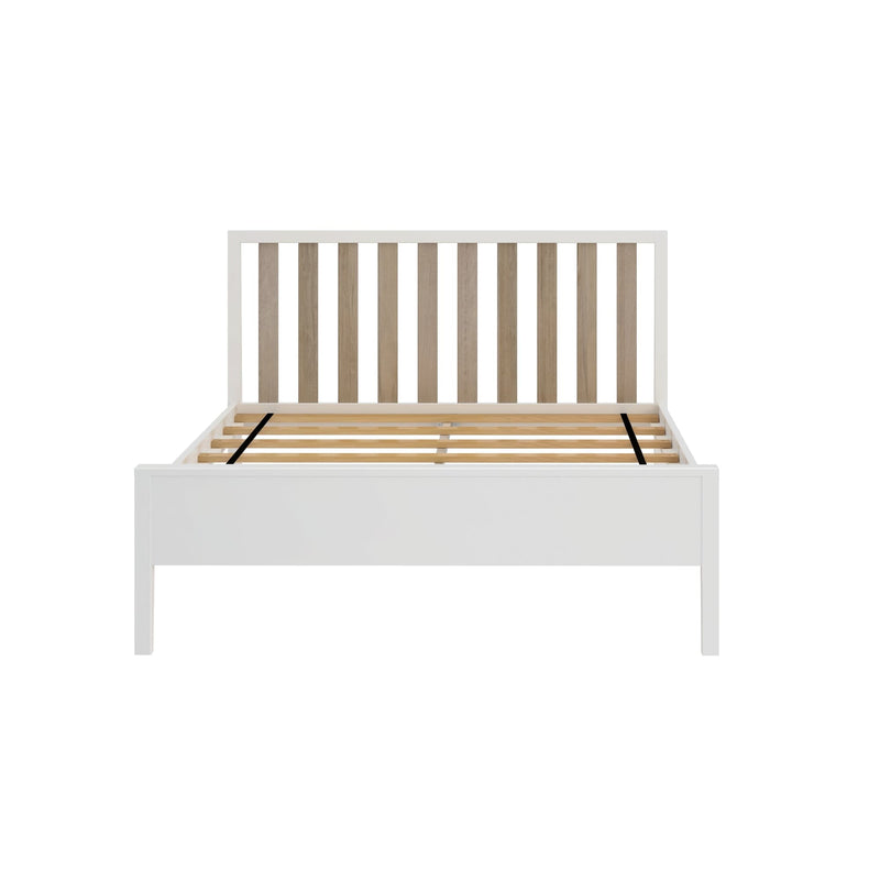 Modern white wooden bed frame with slatted headboard and sturdy construction for bedroom furniture.
