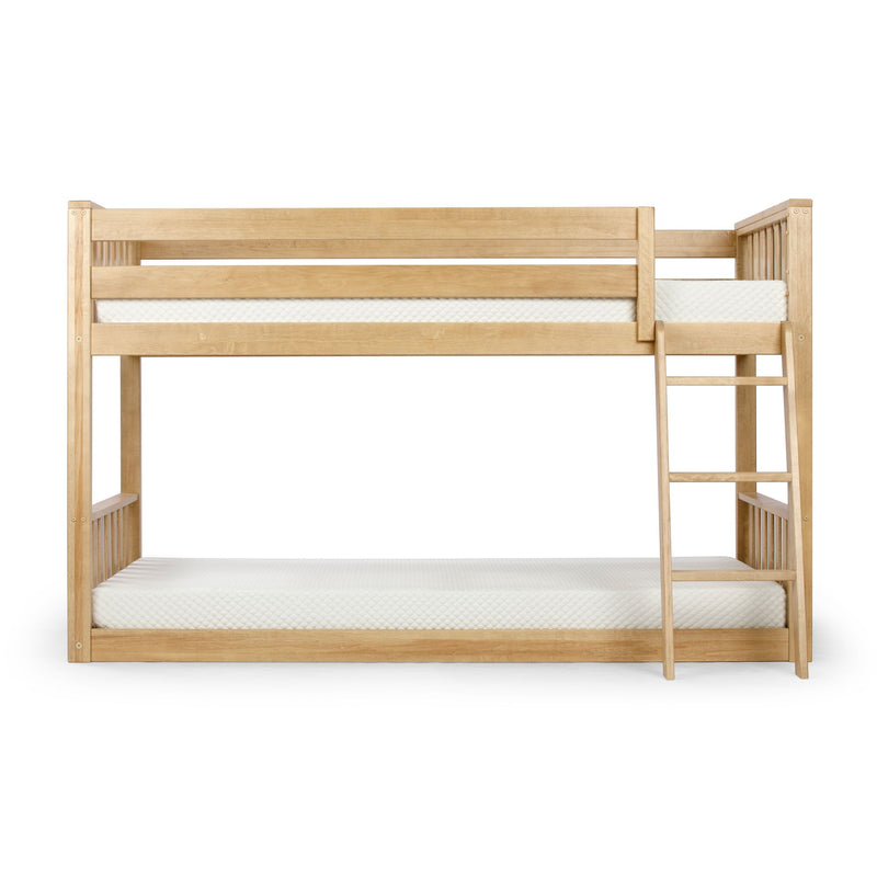 Wooden bunk bed with ladder and white mattresses.