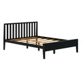 Black wooden platform bed frame with vertical slatted headboard, wooden slats and center support beam, modern minimalist bedroom furniture