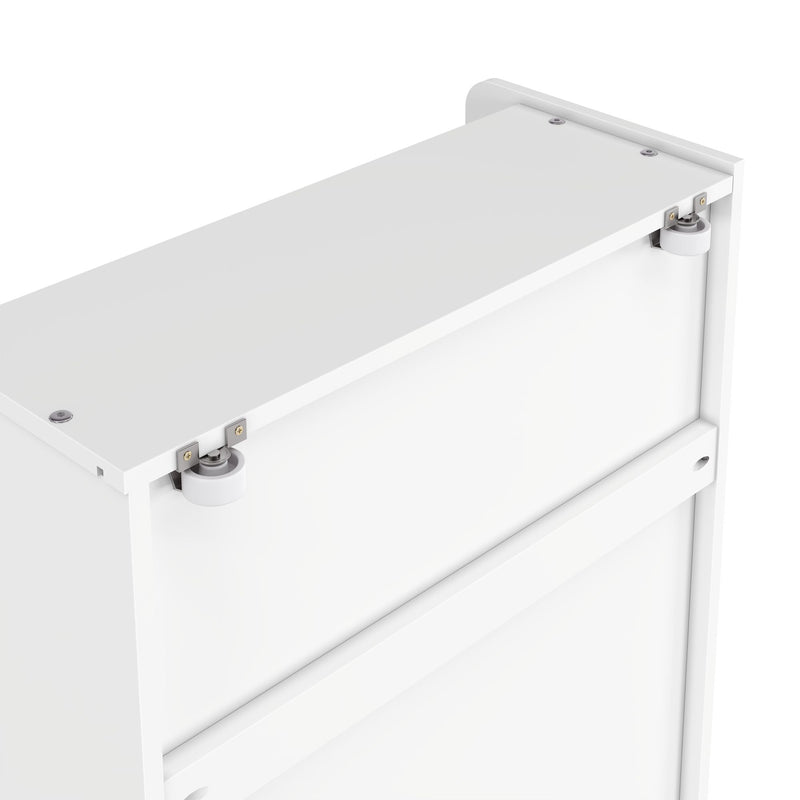 Close-up of white dresser drawer sliding roller hardware and metal fasteners on a white laminate cabinet edge