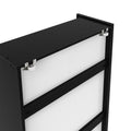 Close-up of black sliding door frame with white panel inserts and top roller hardware, modern interior door track detail