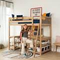 Wooden loft bed with built-in desk, ladder, and storage in kids' bedroom; child with backpack stands on ladder beneath "Go Change the World, Kid" wall sign