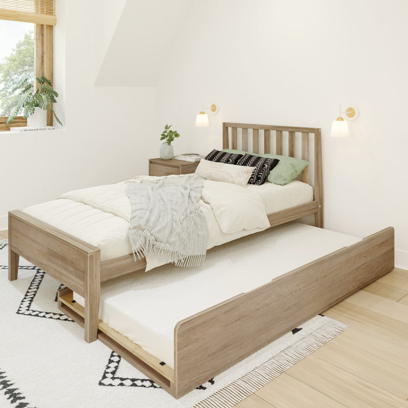 Minimalist wooden bed with trundle in modern bedroom featuring cozy bedding and natural light.