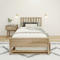 Minimalist Scandinavian bedroom with light wood bed frame, white bedding, patterned pillows, nightstand, wall sconces, plant