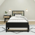 Modern minimalist bedroom with black wood bed frame and light slat headboard, neutral bedding, patterned pillows, bedside vase and wall sconces