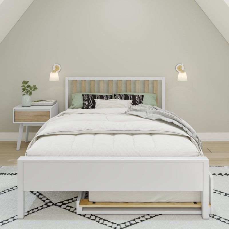 Scandinavian minimalist bedroom with white wooden platform bed and light wood slatted headboard, neutral bedding, green and black accent pillows, white nightstand with potted plant, wall sconces and black-and-white geometric rug