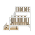 White wooden bunk bed with vertical natural wood slats, built-in ladder and pull-out lower trundle platform in modern farmhouse style