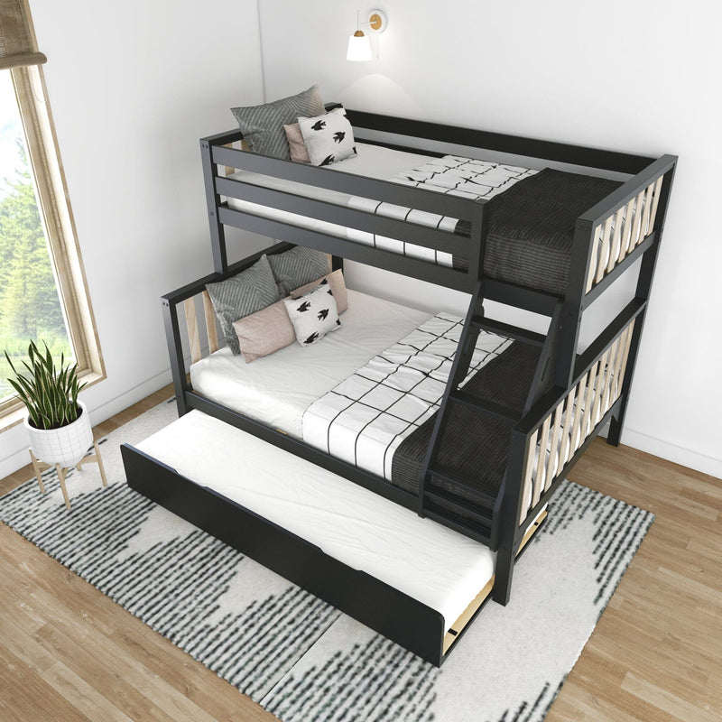 Modern black wooden twin-over-full bunk bed with staircase and pull-out trundle in bright kids' bedroom, white grid bedding, decorative pillows, striped rug and potted plant by window