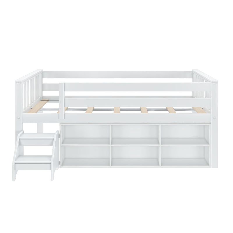 White wooden loft bed with built-in storage shelves and attached staircase, perfect for kids' bedroom organization.