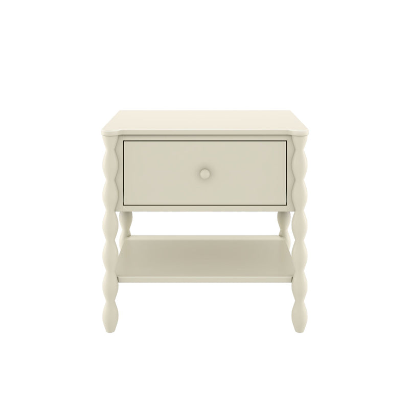 Cream wooden nightstand with single drawer and lower shelf, turned spindle legs, farmhouse bedside table on white background