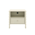 Cream bedside table nightstand with scalloped legs, single drawer, open shelf and built-in power outlet for modern bedroom storage