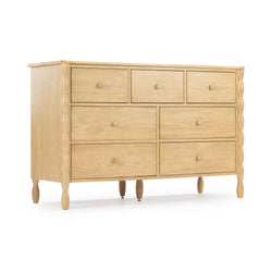 Light natural wood 7-drawer dresser with turned legs and carved side posts, ideal bedroom storage chest