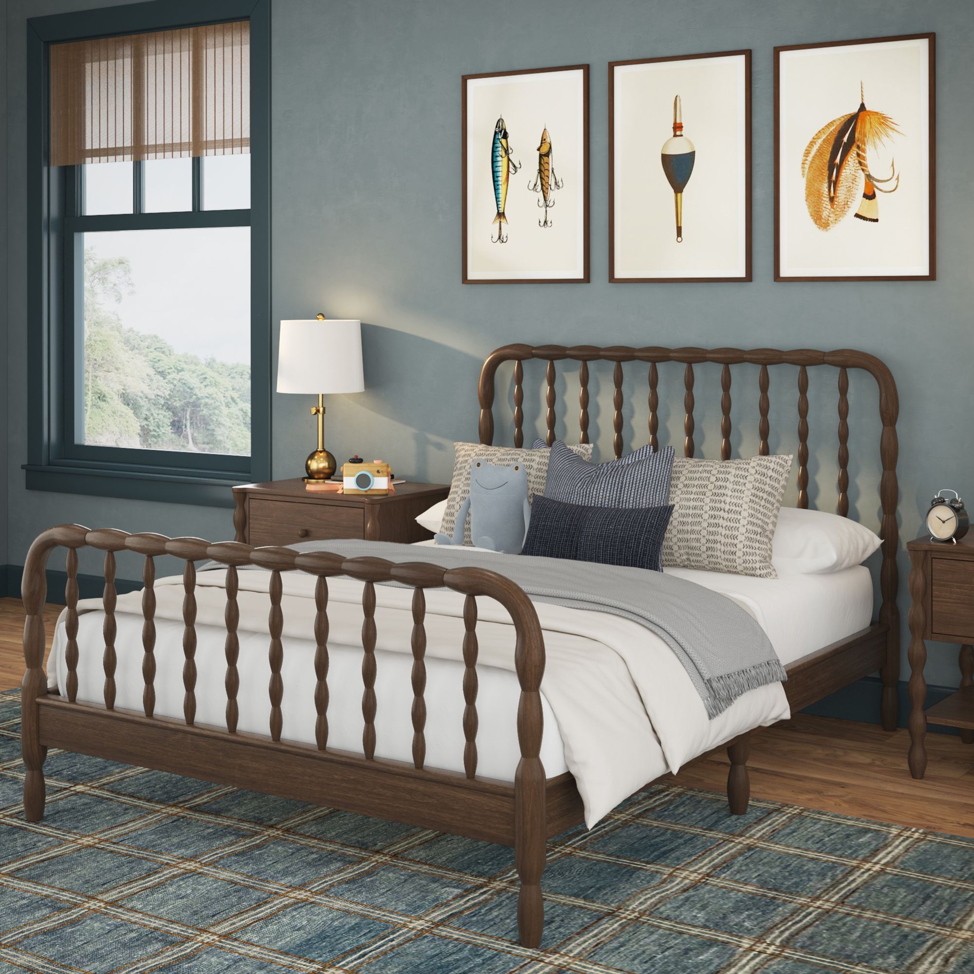 A light-wood finish Jenny Lind  full bed with green and white sheets in a green room. Matching nightstands are on either side of the bed.