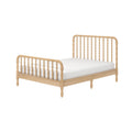 Natural oak wooden spindle platform bed frame with white mattress, turned-wood legs and farmhouse-style headboard and footboard