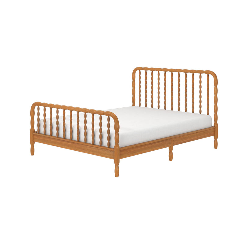 Light wood spindle bed frame with turned headboard and footboard and white mattress, rustic wooden bed