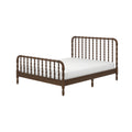 Brown walnut wooden spindle bed frame with matching spindle headboard and footboard, low platform and white mattress on white background