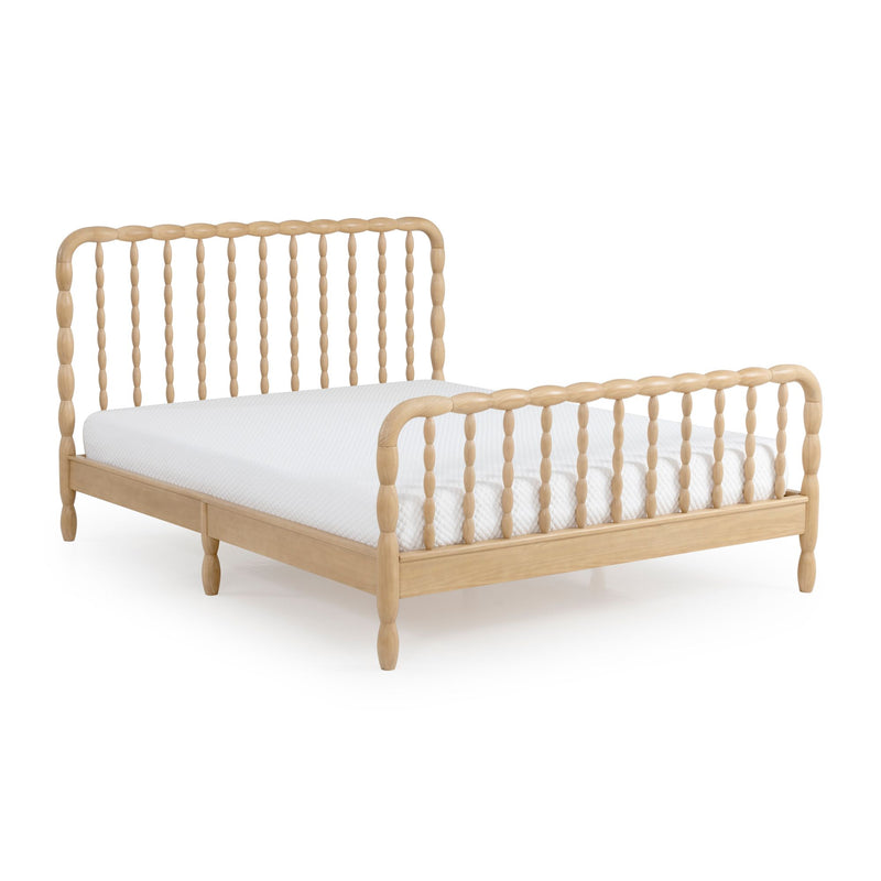 Natural wood spindle platform bed frame with turned posts and white mattress, modern farmhouse style headboard and footboard