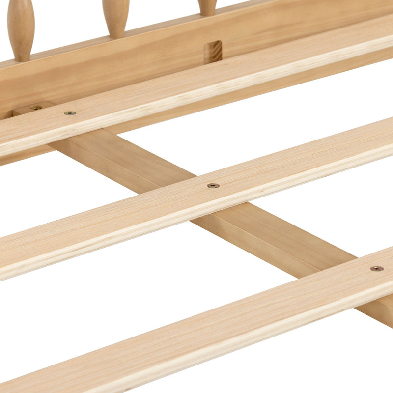 Close-up of natural pine wooden bed slats and central support beam on white background, mattress frame slat system