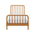 Front view twin farmhouse wooden spindle bed frame with natural oak finish, headboard and footboard, white mattress on white background