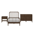 Dark walnut spindle bed frame with white bedding and matching solid wood dresser and nightstand, traditional bedroom furniture set
