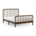 Dark brown wooden spindle bed frame with curved headboard and footboard, white mattress, classic turned-spindle design and low-profile platform base