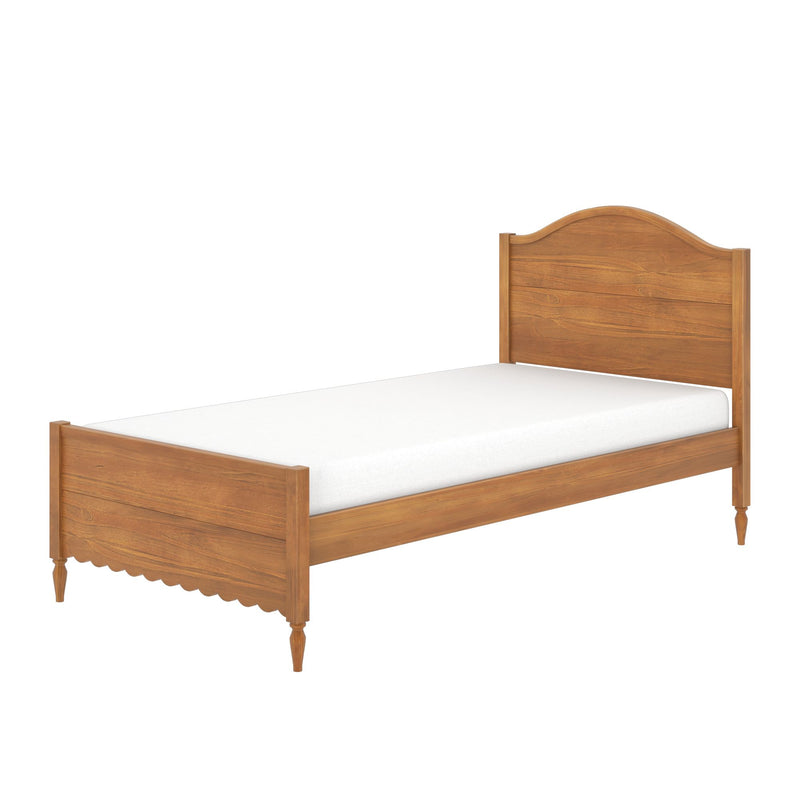 Solid wood twin bed frame with white mattress, arched headboard, scalloped footboard and turned legs in honey oak finish, traditional farmhouse style