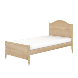 Twin wooden bed frame in light oak finish with arched headboard, scalloped footboard and turned legs, shown with white mattress