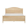 Natural light wood bed frame with arched headboard, scalloped footboard and turned legs, farmhouse-style bedroom furniture