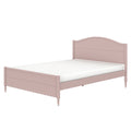 Pink wooden bed frame with white mattress, arched headboard, turned legs and scalloped footboard — shabby chic cottage-style girls' bedroom furniture