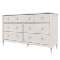 White wooden 9-drawer dresser with round knobs, turned legs and scalloped apron — classic bedroom storage furniture