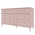 Blush pink six-drawer wooden dresser with round knob handles, scalloped skirt and turned legs — vintage-style nursery bedroom furniture