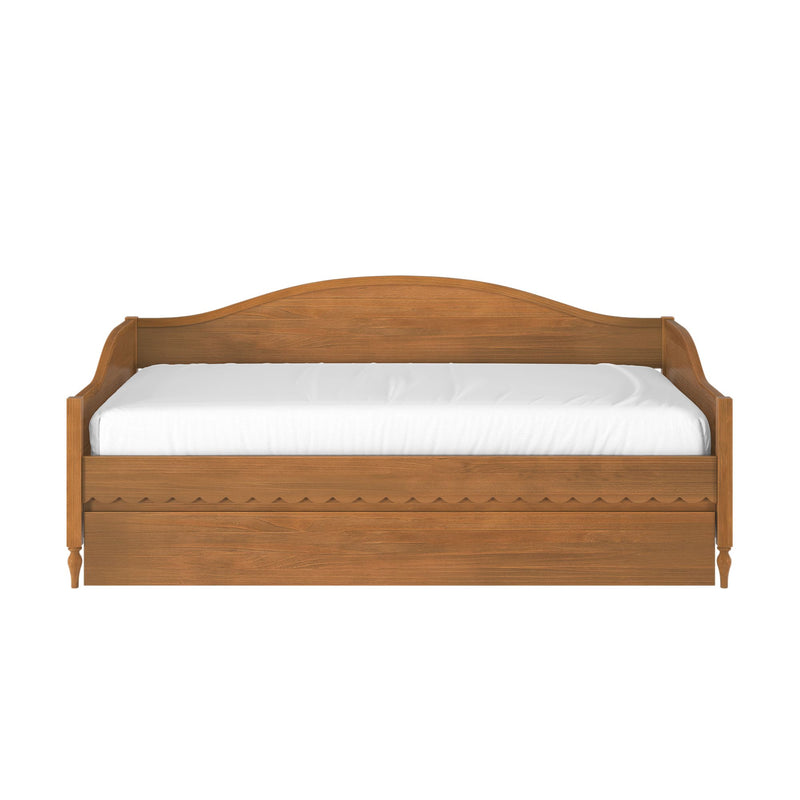 Rustic solid-wood daybed with curved carved headboard and white mattress, farmhouse-style wooden bed frame on white background