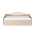 Beige wooden daybed with curved headboard, white mattress and under-bed storage drawer
