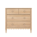 Light natural wood 4-drawer dresser with round knobs, scalloped apron and turned legs – cottage-style bedroom or nursery chest