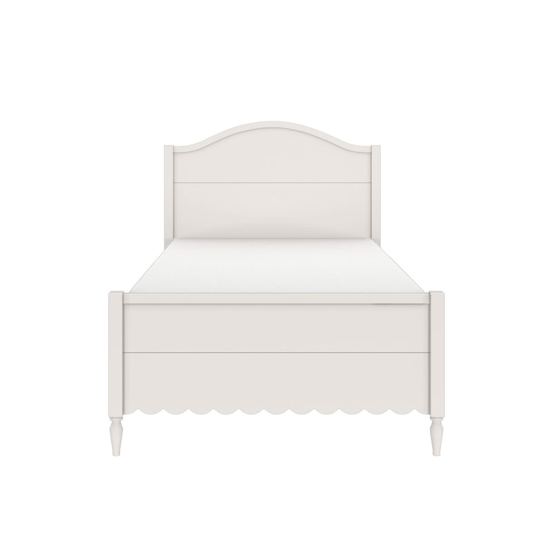 White wooden twin bed frame with arched headboard, scalloped footboard and turned legs, cottage-style bedroom furniture