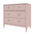 Pink wooden dresser with two small top drawers and two large lower drawers, round knobs, scalloped apron and turned legs