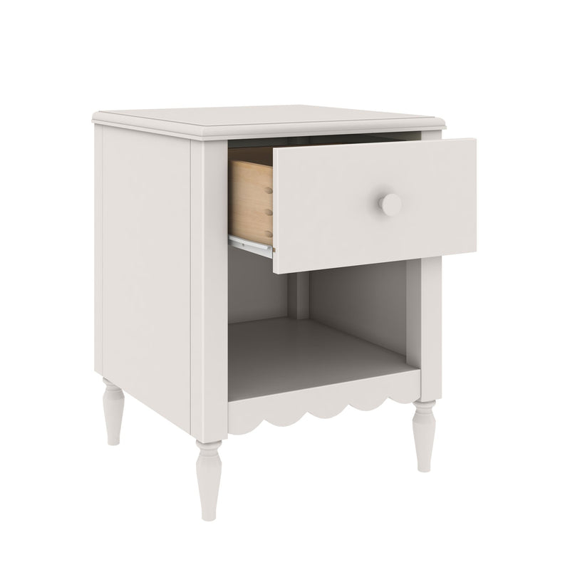 White wooden bedside table nightstand with one open drawer and lower shelf, turned legs and scalloped apron, farmhouse style